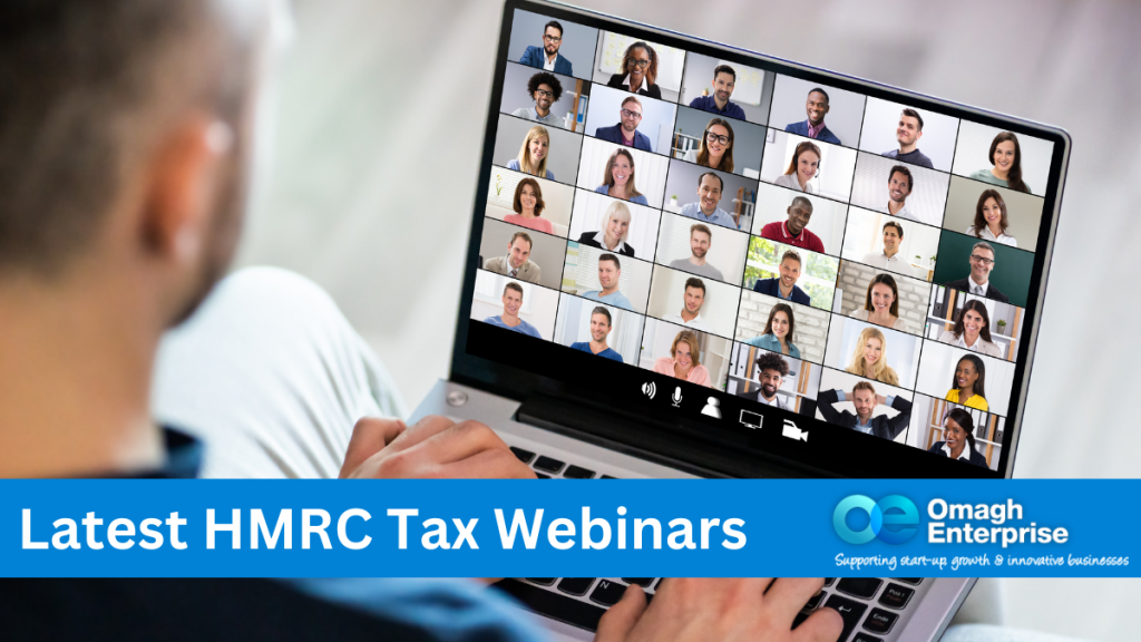 Looking over a man's shoulder, as he works on his laptop. There are30 people on a Zoom call on his screen. Blue banner along the bottom. White text "Latest HMRC Tax Webinars" Omagh Enterprise logo within the banner.