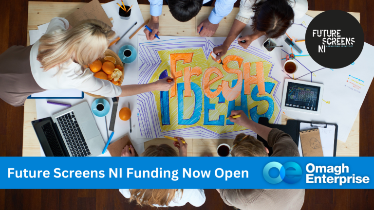 Bird's eye view, looking down on a desk of 5 people designing craft. A colourful graphic saying "Fresh Ideas" Blue banner along the bottom, with white text. "Future Screens NI Funding Now Open" Omagh Enterprise logo within banner.