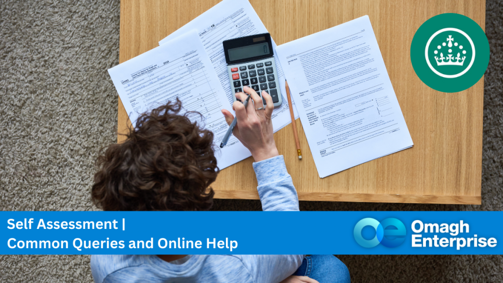 A person uses a calculator on a table with documents. Text on the image reads: "Self Assessment | Common Queries and Online Help, Omagh Enterprise.