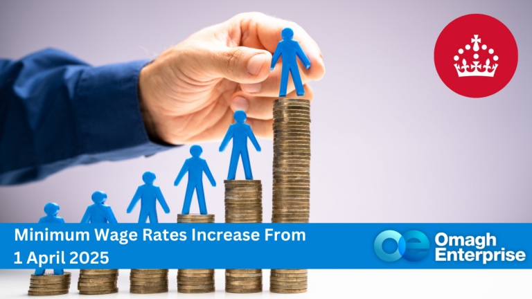 A hand arranges blue human figures on stacks of coins in ascending order. Text reads Minimum Wage Rates Increase From 1 April 2025 with Omagh Enterprise logo and a red circle with a crown symbol in the top right corner.